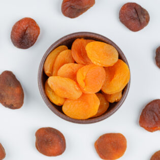 dried-apricots-clay-bowl-top-view